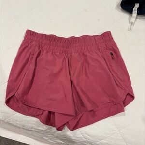 Lululemon Women’s Pink Athletic Shorts - Elastic Waist, Zip Pocket size 8